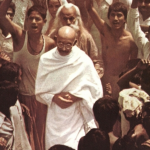 Gandhi in a crowd.